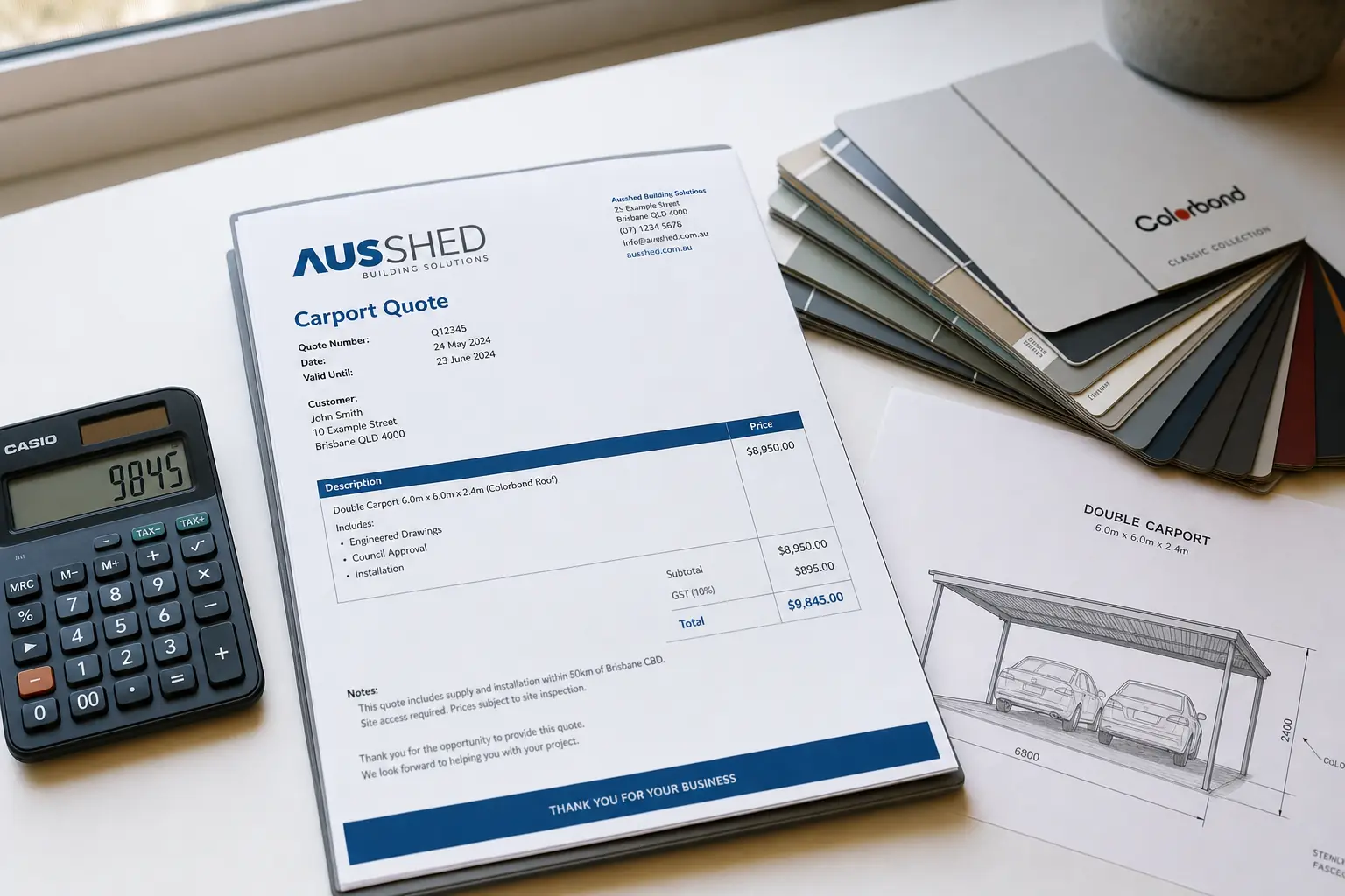 Carport quote on company letterhead with Colorbond colour samples, a calculator and an architectural sketch on a clean desk